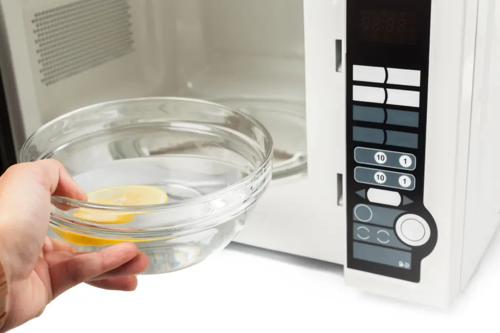 What Are the Safety Precautions While Boiling Water in a Microwave